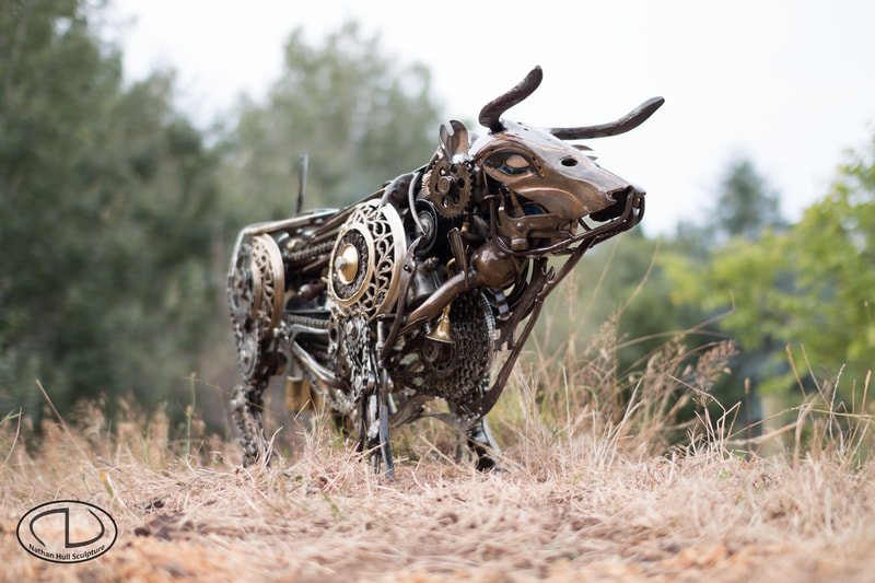Bull from an array of recycled tools, farm machinery parts.